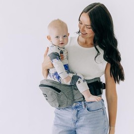 Tushbaby - Portabebés de cadera original para bebés y niños pequeños, certificado seguro, diseño ligero, almacenamiento integrado, soporte de enfermería, sin relleno de espuma, (gris)