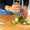 7-in-1 Multi-Function Kitchen Tool – Vegetable Peeler, Grater, Slicer, and