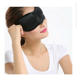 Contoured sleeping mask for travel, sun bathing and yoga meditation.
