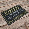 Black And Gold ‘WARNING' '24 HOUR VIDEO SURVEILLANCE’ Warning Sign.