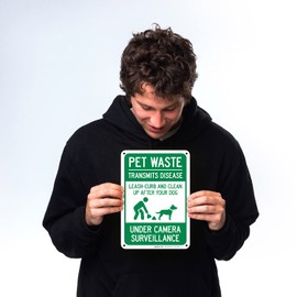 Sigo Signs Pet Waste Leash-Curb and Clean Up After Your Dog Under Camera Surveillance Sign, (SI-63188) 10x7 Inches, Rust Free .040 Aluminum, Fade Resistant, Made in USA