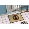 Caroline's Treasures DAC2322MAT Black Russian Terrier Christmas Flowers Doormat Front