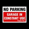 No Parking Garage in constant use Plastic Sign - Private