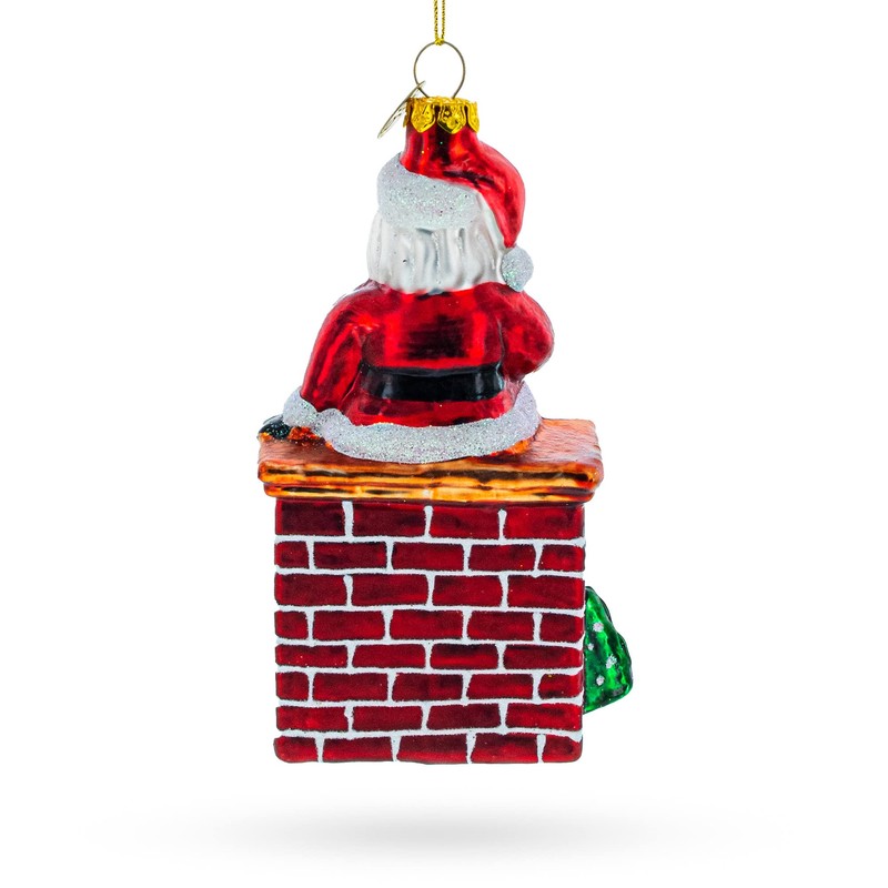 Cozy Santa Sitting on Fireplace Glass Christmas Ornament