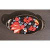 Lodge Heat Enhanced and Seasoned Cast Iron Oval Mini Server,