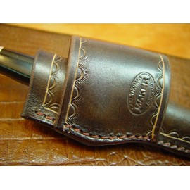 Custom Cross Draw Knife Sheath for Buck 102 Knife. The Sheath Is Made Out of 10 Ounce Water Buffalo Hide Leather the Leather Is Soft Pliable and Very Durable. This Sheath Can Be Worn on the Right or Left Hand Side. It Is Died Dark Brown with Border Tooli