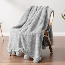 Pavilia Light Grey Sherpa Throw Blanket for Couch, Warm Plush Fuzzy Blanket Throw, Gray Sofa Throw, Lightweight Soft Cozy Fluffy Blanket with Pom Poms, Light Gray, 50x60