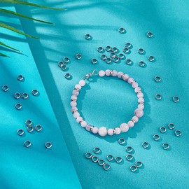 UNICRAFTALE 200Pcs 4mm Hole Small Ring Loose Beads Stainless Steel Spacer Beads Metal Spacer Bead Smooth Bead Findings Loose Beads Large Hole Spacer Bead for Jewelry Making Supplies