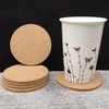 Pack of 12 cork coasters (9 x 0.4 cm) and