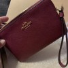 COACH STAR GLITTER BLACK CHERRY WRISTLET W/2 CHARMS