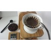 Kalibrera - flat-bottom ceramic pour-over coffee dripper.