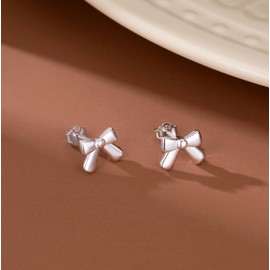 SLUYNZ 925 Sterling Silver Cute Bow Stud Earrings for Women Teens Bow Ribbon Stud Earrings (A-SILVER)