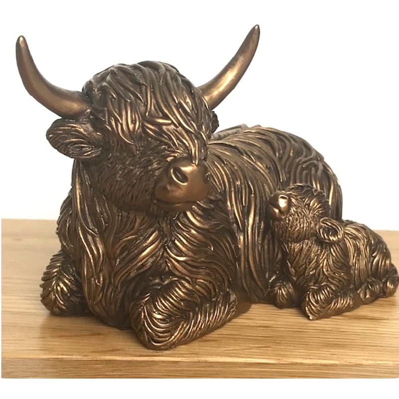 Laying Highland Cow Mother & Calf ornament figurine from the
