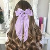 1 x Bow Hair Clip and 1 x Elastic Bow