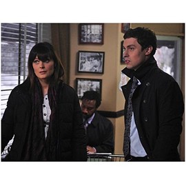 Emily Deschanel as Dr. Brennan Looking Up to Side and John Francis Daley as Dr. Sweets in Black Trench Coat With Collar Up 8 x 10 Photo