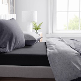 sleepling Flannelette Fitted Sheet, Made in Germany, 100% Cotton, Mattresses up to 23 cm High, All-Round Elastic, Oeko-Tex, Washable at 60 °C, 140 x 200 cm, Black