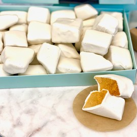 White chocolate honeycomb sponge candy. Crunchie chunks of honeycomb candy hand dipped in gourmet white chocolate (White-Chocolate)