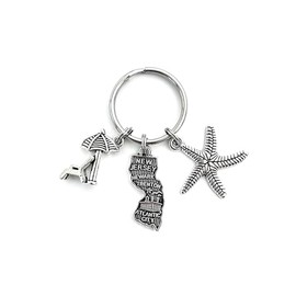 New Jersey beach theme custom keychain. Includes State of New Jersey and choice of beach themed charms including Starfish, Shell, Tropical Fish, Ship Wheel, Anchor, etc.