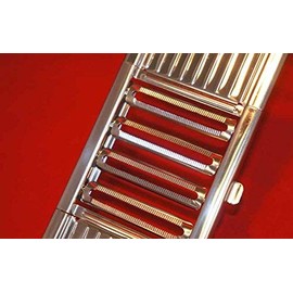 Muxel Gigant 4-way vegetable slicer with 3 additional inserts. V-slicer, julienne slicer and Parmesan cheese grater.