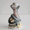 Decorative Ceramic Cobra Figurine with Gold Accents – Symbol of