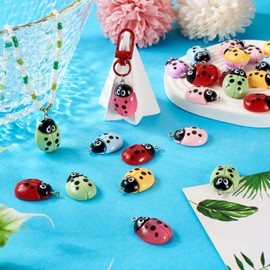 Bestewelry 28Pcs Acrylic Insect Charms - 7 Colors Cute Ladybug Pendants - Flatback Animal Flying Insect Ladybird Charms with Loop for DIY Crafts Earrings Bracelets Necklaces Jewelry Making