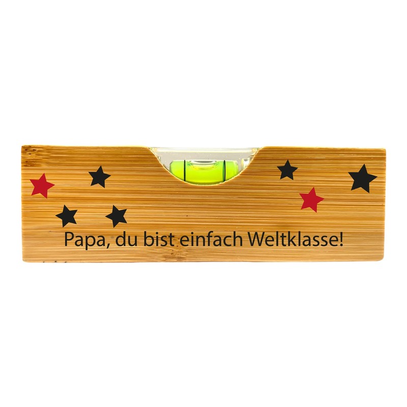 Spirit level with bottle opener with the words "Bester Papa