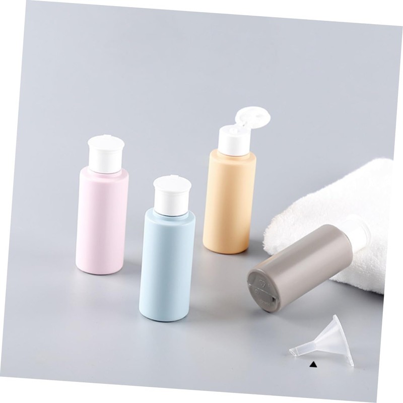 Mikinona Compact 4 Pack Travel Bottles 50ml Squeeze Shampoo Dispenser