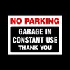 No Parking Garage in Constant Use Plastic Sign with double