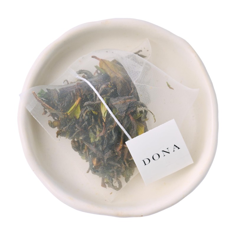 Dona single origin, premium blended teas conveniently packaged in plant-based