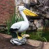 Homestyles 20 in. Pelican on Ocean Coastal Rock Collectible Beach