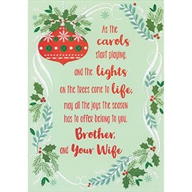 Designer Greetings Red Ornament, Sparkling White Ribbon, Holly and Pine Border on Light Green Christmas Card for Brother and Wife