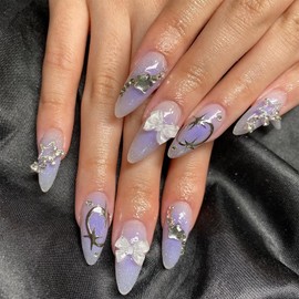 24 Pcs Almond Press on Nails Medium Fake Nails Purple Full Cover Stick on Nails with Starry Stars Bow Knot Designs Glossy False Nails 3D Nail Charms French Tip Nails for Women Girls