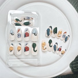 24 Pcs Pumpkin Press on Nails Medium Length Autumn Flower Fake Nails Almond Shape Thanksgiving Day Acrylic Nails Matte Designs Reusable Fall Pumpkins False Nails Stick on Nails for Women Girl Nail Art