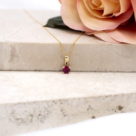 Carissima Gold Women's 9ct Yellow Gold Magenta 5mm CZ July Birthstone Pendant on 9ct Yellow Gold 20 Diamond Cut Curb Chain 46cm/18'