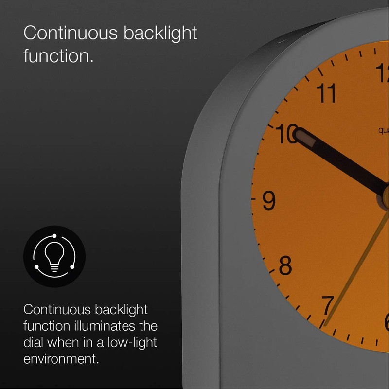 Braun classic analogue alarm clock with snooze and continuous backlight,