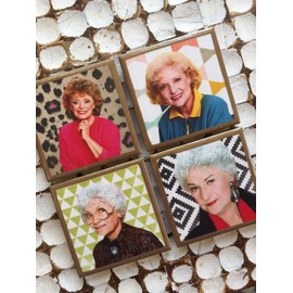 Golden Girls coasters with abstract backgrounds and gold trim