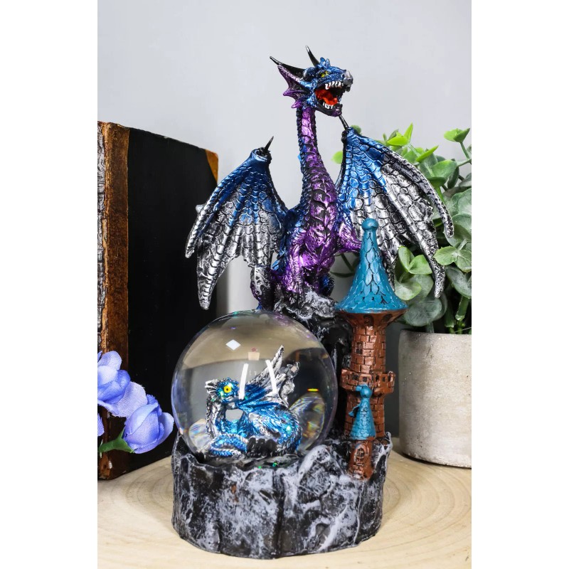 Metallic Blue Dragon On Cliff Rocks Castle With A Wyrmling