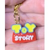 Toy Story Logo Word Charm Gold Zipper Pull & Keychain