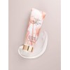 Loción corporal hidratante de leche de coco y rosas