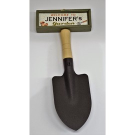 "Welcome to Jennifer's garden" hanging shovel sign