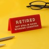 CGB Giftware | Red Acrylic Desk Sign ‘Retired But Still