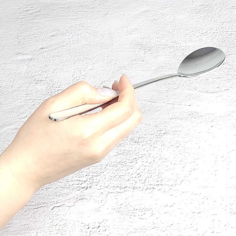 Pristine pastel-colored premium quality domestic cutlery set with good grip,