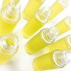 A single drop of natural hair oil with rich herbal