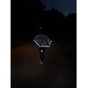 Knirps children's compact umbrella with reflective trim.
