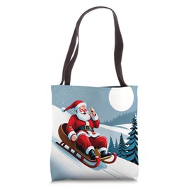 Santa Claus Sledding Down a Hill on Christmas Eve Tote Bag