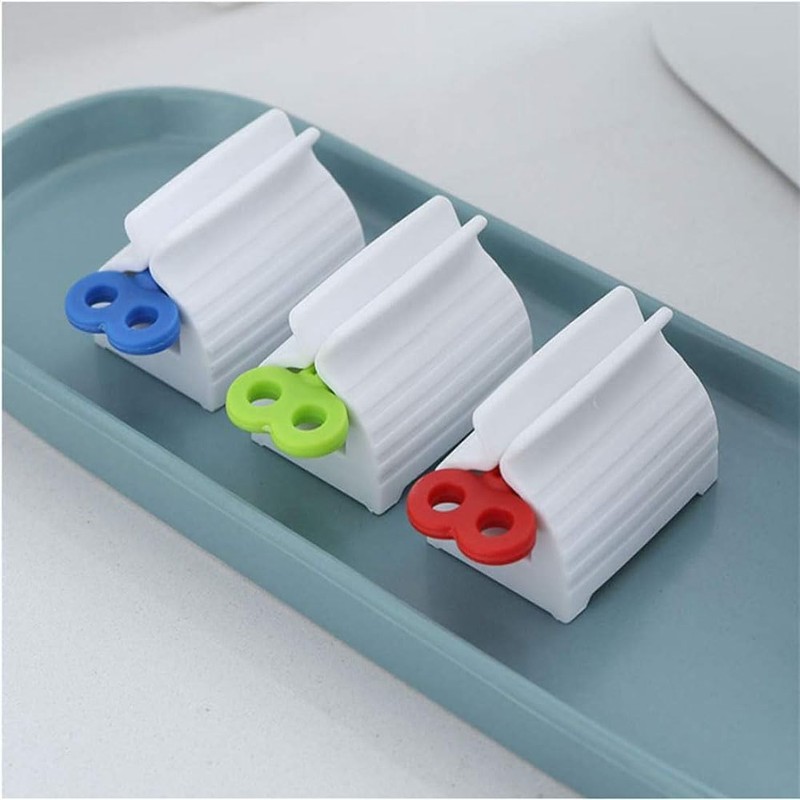 DERDOUT Toothpaste Tube Squeezer,Plastic Rolling Tube Toothpaste Dispenser Tube Wringer