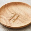 Philip Jones Gold Plated Twist Drop Earrings Created with Zircondia®