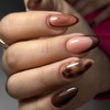 Uñas postizas de color marrón oscuro con punta francesa y