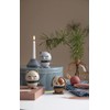 Hoptimist Lambert Push Puppet light red/glossy/H 7cm/Ø 7cm/with spring mechanism