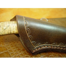 Custom Leather Vertical Knife Sheath. The Sheath Is Made Out of 10 Ounce Water Buffalo Hide Leather with a Border Tooling Dyed Dark Brown. The Sheath Is Made Out of Water Buffalo Leather the Water Buffalo Leather Is Very Soft Pliable and Durable. The She